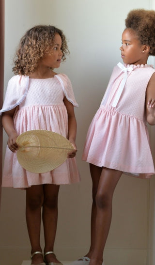 Dress with angel sleeves in light pink