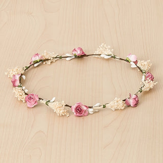 Crown with pink roses and tiny dry blossoms